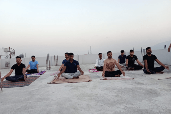 Image of students practicing yoga at Tejash Defence Academy in Dehradun